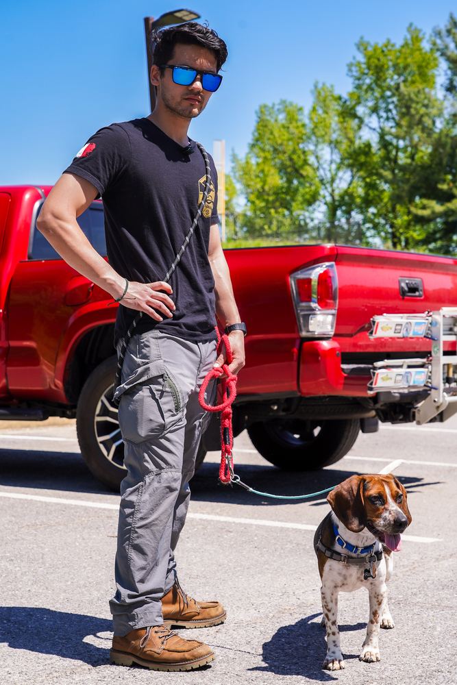 Riley the beagle standing with his owner in a parking lot, pet portrait by Campbell Shepard, Frederick, MD